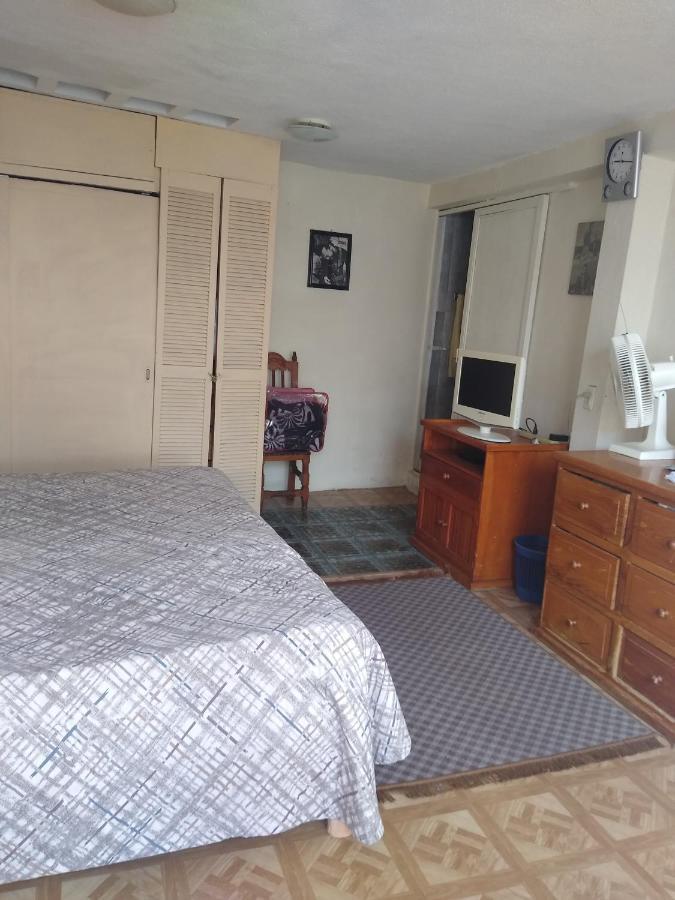 Cerca Del Aeropuerto Habitación en casa particular