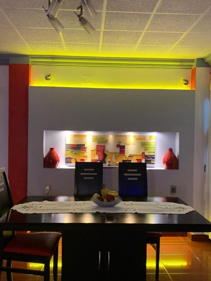 Hermosa Casa A 10 Minutos Del Aeropuerto Habitación en casa particular