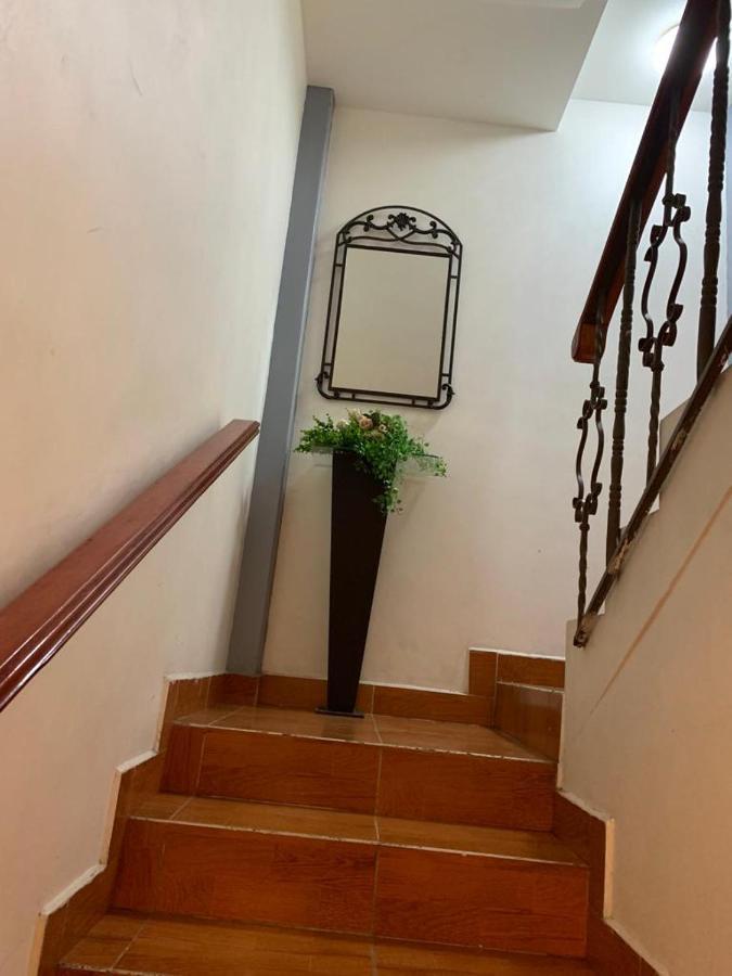 Hermosa Casa A 10 Minutos Del Aeropuerto Habitación en casa particular *