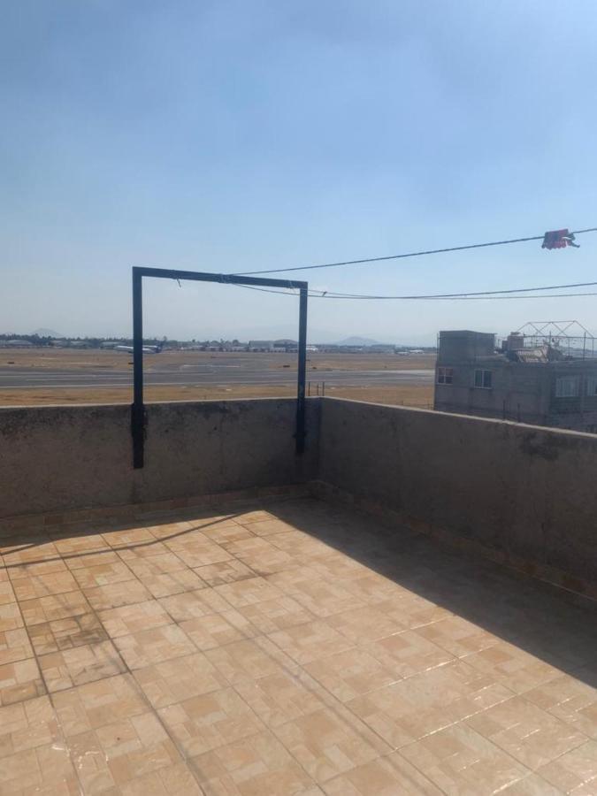 Hermosa Casa A 10 Minutos Del Aeropuerto Habitación en casa particular