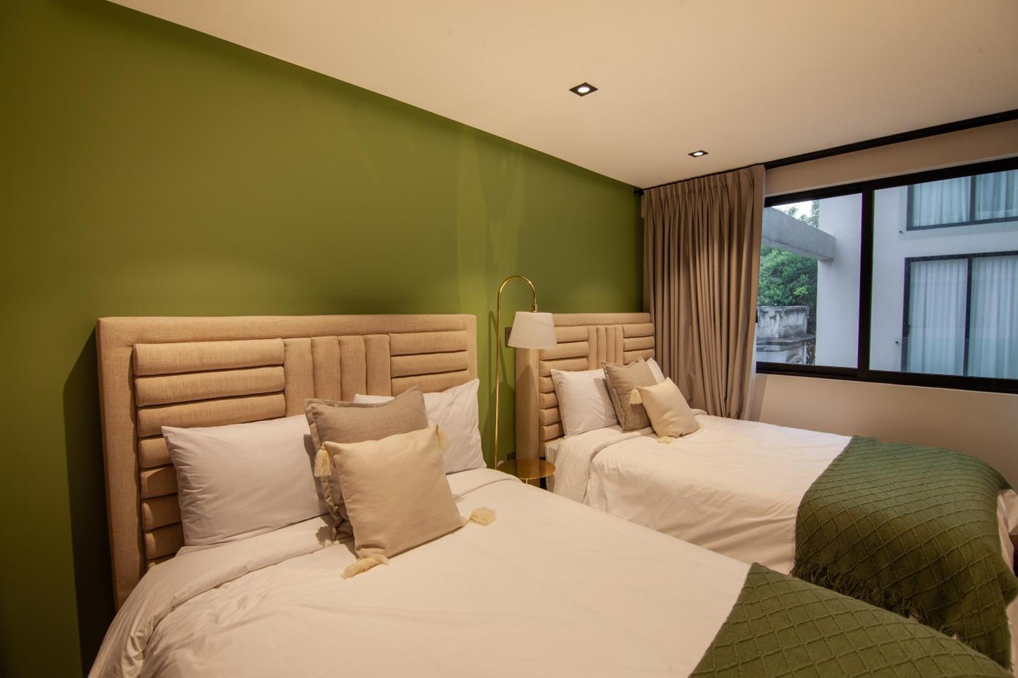 Nowness Apartahotel