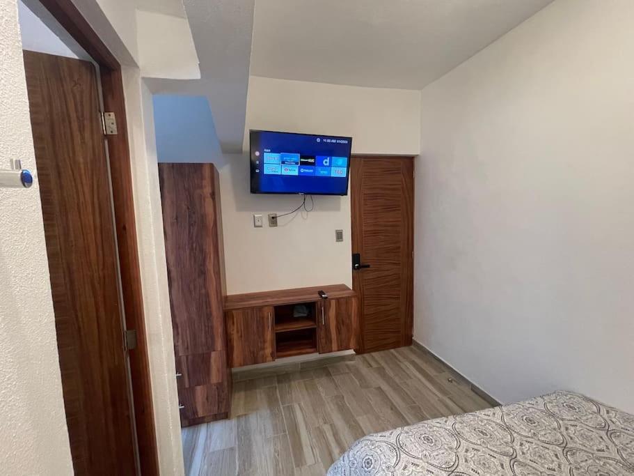 Apartahotel C O V A D O N G A