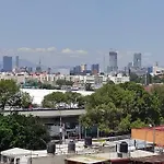 Departamento con vista al poniente de la ciudad.
