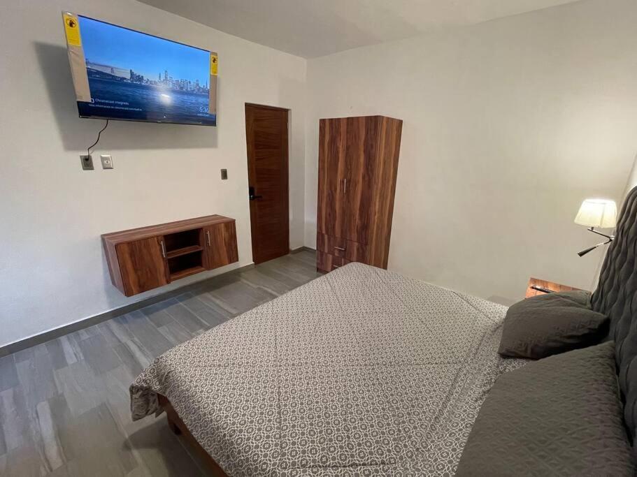 Apartahotel C O V A D O N G A