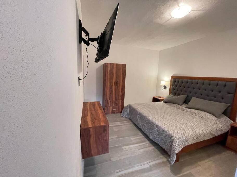 C O V A D O N G A Apartahotel